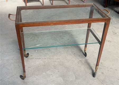 Carrello portavivande in legno con gambe rastremate e due ripiani in cristallo,