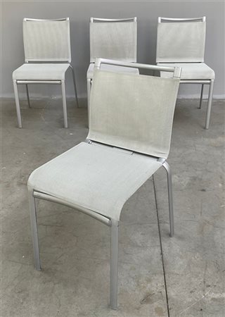 Gruppo di quattro sedie in tubolare di alluminio verniciato grigio e tessuto si