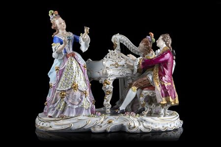 Manifattura del secolo XX. "Concertino" Gruppo in porcellana decorata in policr