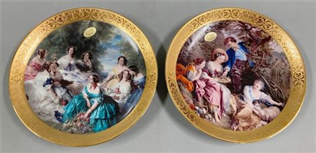 Manifattura di Limoges. Coppia di piatti in porcellana decorati in policromia a