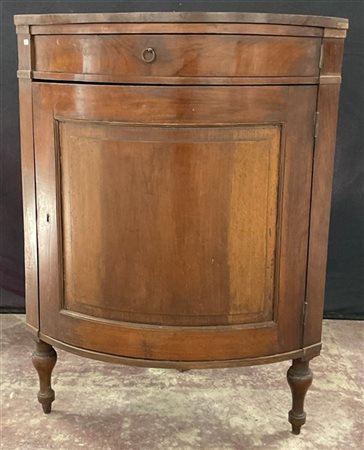 Angoliera lastronata in noce con cassetto ed anta riquadrata sul fronte, piedin