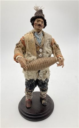 Arte napoletana, secolo XIX. "Pastore con otre" scultura da presepe in terracot