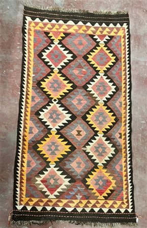 Tappeto Kilim, Anatolia, inizio secolo XX. Decoro geometrico nei toni del giall