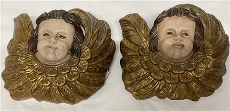 Coppia di sculture in gesso dipinto raffiguranti angeli Cherubini (cm 24x9x22)