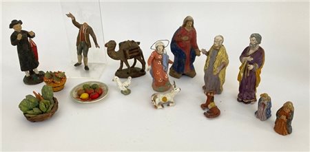 Lotto composto da alcuni pezzi da presepe in ceramica dipinta in policromia di