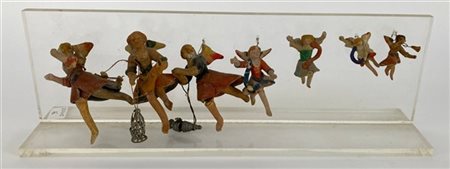 Collezione di sette sculture in ceramica dipinta in policromia raffiguranti ang