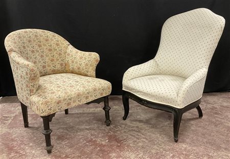 Lotto di due poltrone imbottite con gambe in legno ebanizzato (difetti)