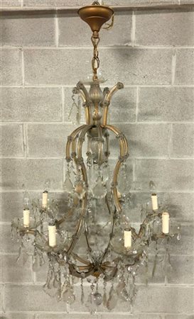 Lampadario "Maria Teresa" di forma sagomata a otto luci più due centrali, strut