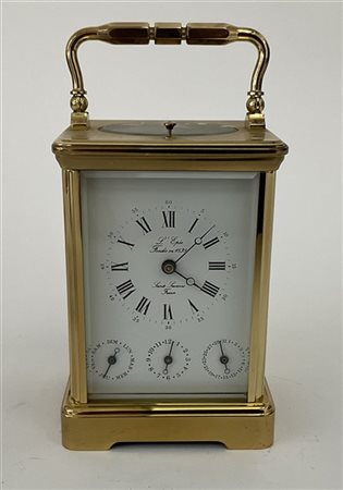 JAEGER LECOULTRE orologio da scrivania in ottone. Quadrante bianco a indici applicati, apertura per la data. Secolo XX (difetti)