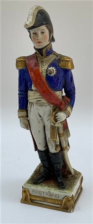 Scultura in porcellana policroma raffigurante Bertrand (h cm 25)