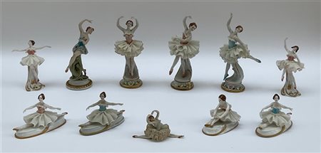 Lotto di undici sculture in porcellana policroma raffiguranti ballerine (h max
