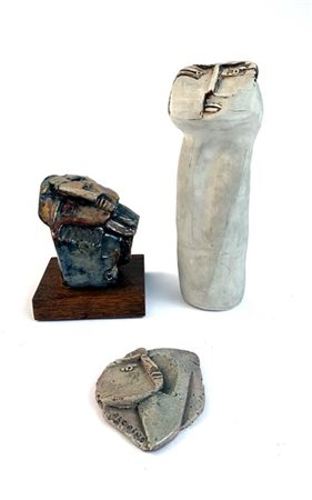 Lotto composto da tre sculture di materiali e misure diverse (h max cm 33) due