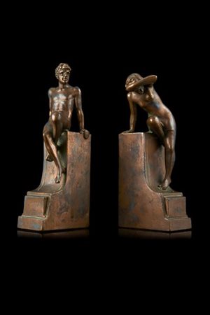 Artista dell'inizio del secolo XX. Coppia di fermalibri in rame raffiguranti nu