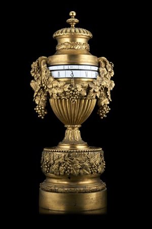 JULIEN LEROY
Pendola a ''cercles tournants'' in bronzo dorato a foggia di vaso