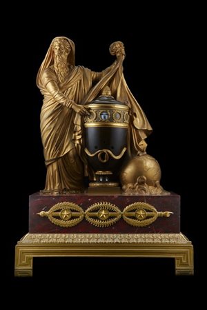 Pendola a ''cercles tournants'' a soggetto allegorico in bronzo dorato e patina