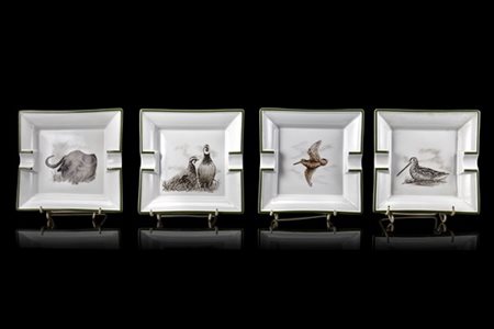 Quattro posacenere in porcellana dipinta in policromia decorati da animali diff