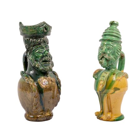 DUE VERSATOI raffiguranti maschere apotropaiche