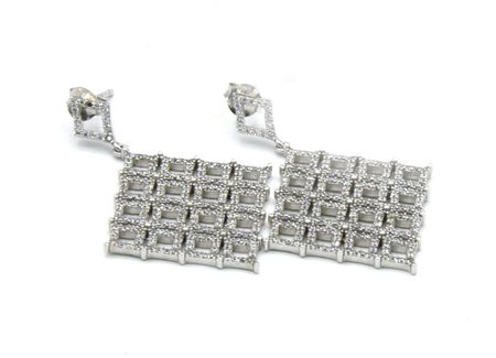 ORECCHINI PENDENTI A MOTIVO GEOMETRICO in argento 925 decorato con pave' di...