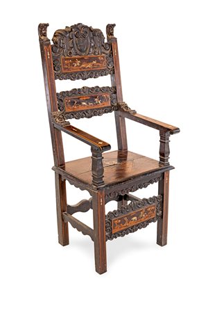 Seggiolone in noce intagliato a grottesche rinascimentali, fine del XIX secolo