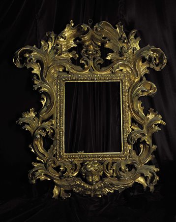 IMPORTANTE CORNICE BAROCCA DA SPECCHIERA Roma, 1650-1670 ca. Legno intagliato...