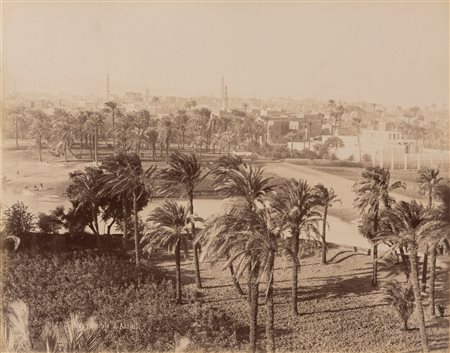Félix Bonfils (1831-1885)  - Chameliers en marche dance le désert ; vue générale Assiut, 1880s