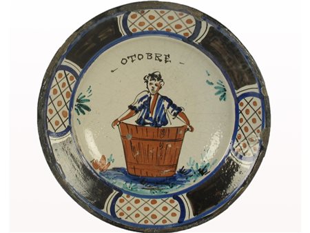 Piatto in maiolica Montelupo Fiorentino. Epoca XVII secolo. Raffigura il mese...