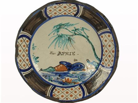 Piatto in maiolica Montelupo Fiorentino. Epoca XVII secolo. Raffigura il mese...