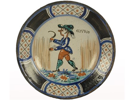 Piatto in maiolica Montelupo Fiorentino. Epoca XVII secolo. Raffigura il mese...