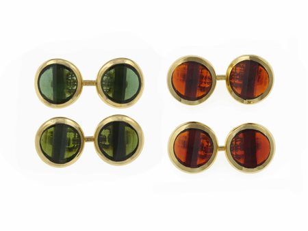 Pomellato. Due paia di bottoni da polso con quarzi e granati