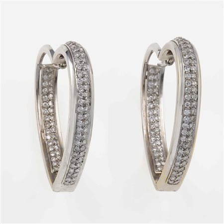 Orecchini "cuore" con diamanti