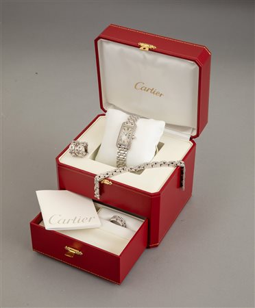 Cartier. Parure composta da anello, orecchini, bracciale ed orologio modello “Maillon Panthère”