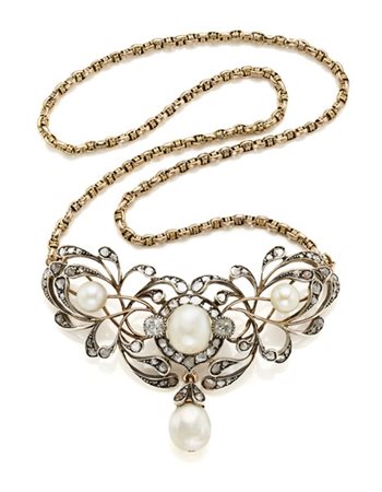 Centrale floreale in oro, argento, diamanti old mine per complessivi ct. 1,05 c