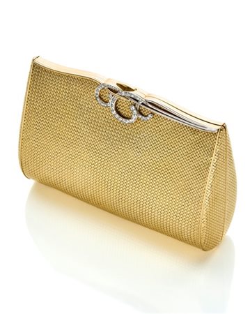 Borsa clutch in oro giallo con lavorazione a cestino, la chiusura in oro bianco