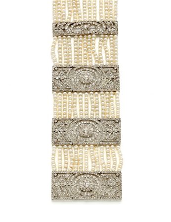 Bracciale a più fili di perle di mm 3 circa con distanziatori e chiusura in pla