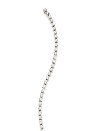 CARTIER
Bracciale tennis in platino e diamanti tondi per complessivi ct. 6,00 c