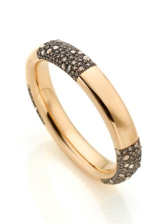 POMELLATO
Bracciale rigido "tango" in oro rosa con diamanti brown per complessi