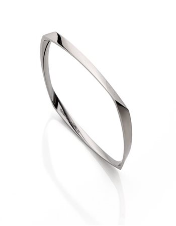 FRANK O. GEHRY per TIFFANY & CO.
Bracciale rigido sagomato in oro rodiato, g 23