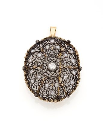 Spilla/pendente ovale in oro giallo e argento lavorata a traforo con diamante c