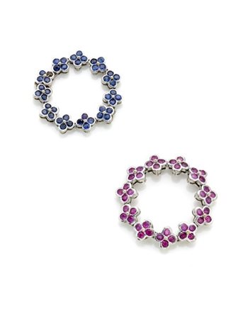 SABBADINI
Coppia di anelli morbidi in oro bianco con fiori in zaffiri e rubini,