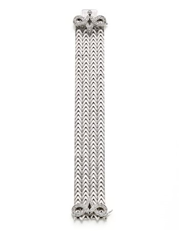 MICHELETTO
Bracciale a fascia intrecciata in oro bianco cesellato con chiusura