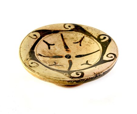 PIATTELLO DI GENUCILIA DATAZIONE: III sec. a.C. MATERIA E TECNICA: argilla...