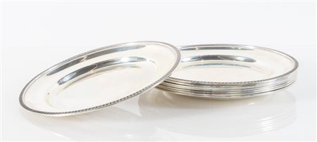 GREGGIO RINO, Padova, metà del XX secolo. Otto piattini in argento 800. Reca...