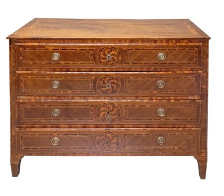 Cassettone Luigi XVI lastronato e filettato in rigatino di noce, frutto e...