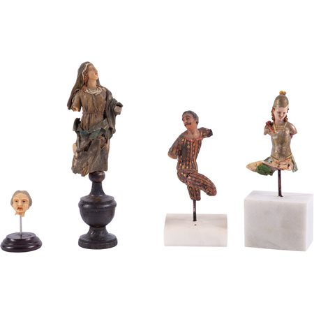 QUATTRO FRAMMENTI di sculture in cera