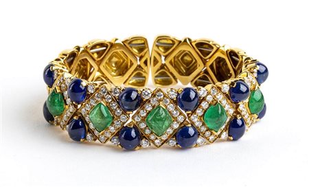 Bracciale a fascia elastica in oro con diamanti,  smerladi e zaffiri cabochon - firmato GIULIO VERONESI 