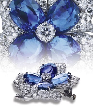 Spilla a fiore in platino ed oro con zaffiri e diamanti 