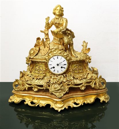 Orologio in metallo dorato in teca, nineteenth century