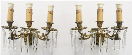 Coppia di applique in metallo dorato a tre luci, Nineteenth century