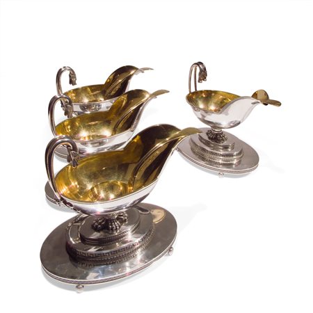 Quattro salsiere in argento e vermeil con presentoir e cucchiaio, Milano 1805 circa 