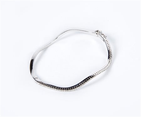  
Bracciale rigido in oro e brillanti 
 polso cm 18